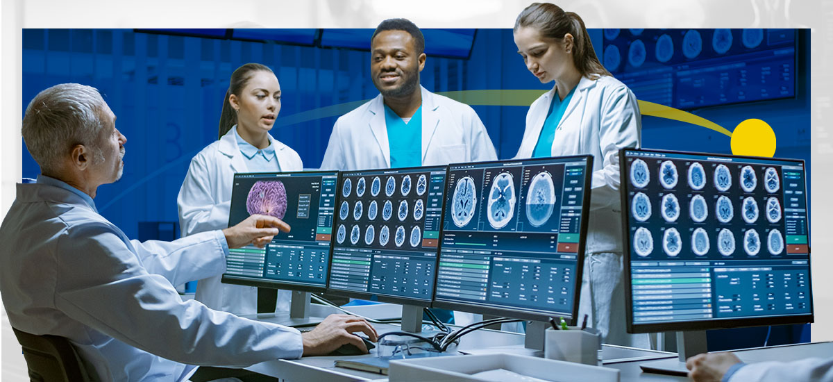 A group of radiologists review images on desktops