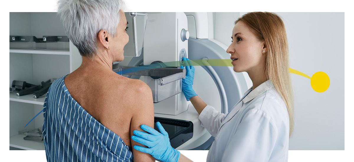 A woman gets a mammogram at the doctor's office