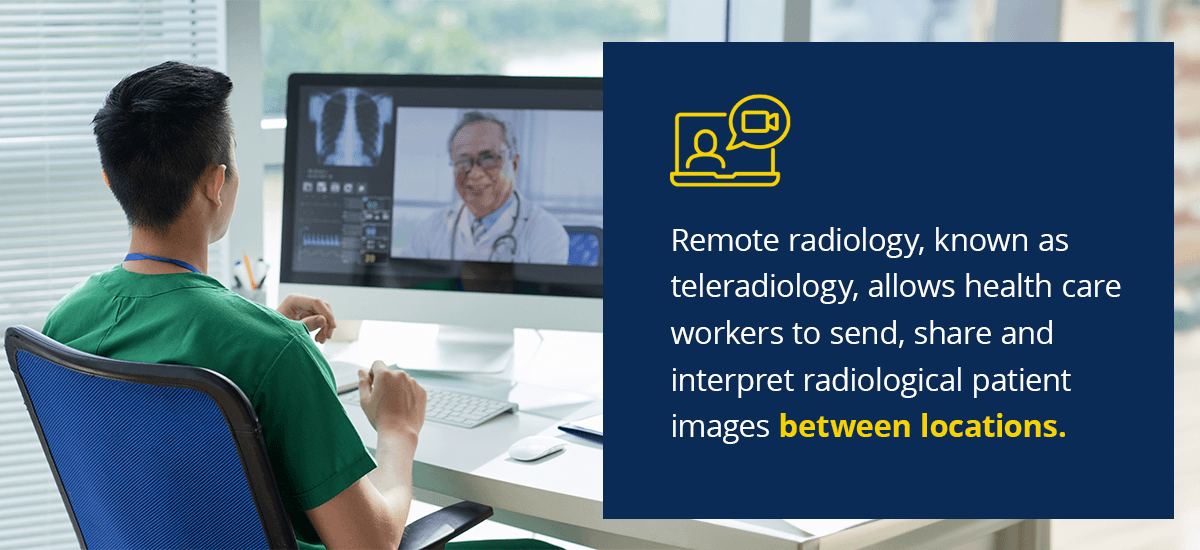 A teleradiologist works on a desktop at home while talking with another doctor
